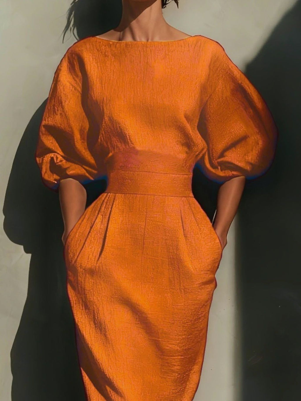 Round Neck Puff Sleeves Midi Dress in orange textured fabric with a fitted waist