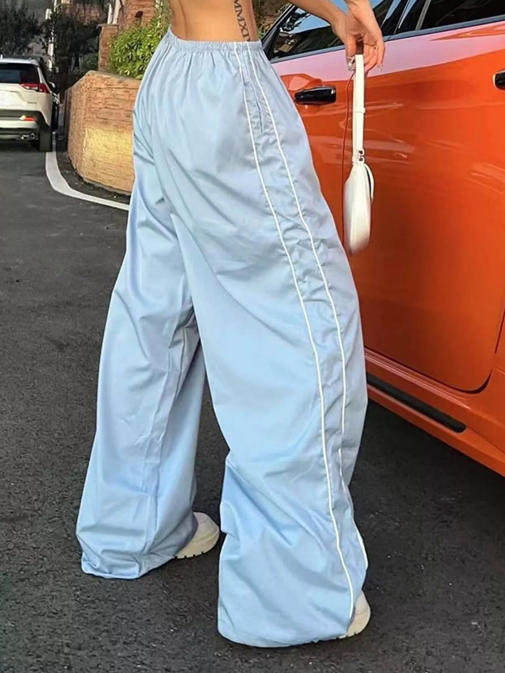 Elastic waist wide-leg pants by Trendsi in light blue with white piping
