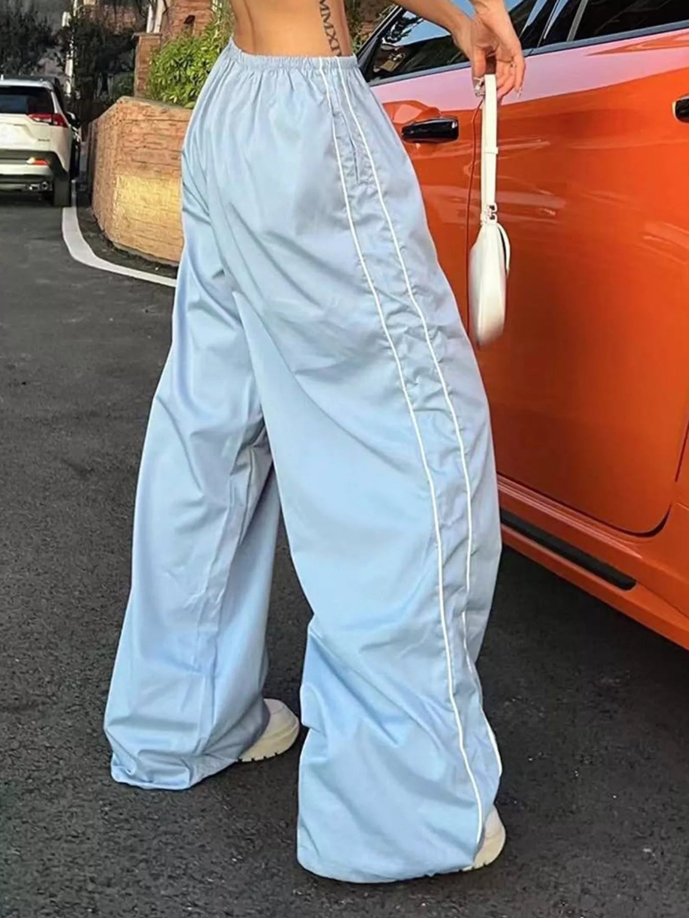 Elastic waist wide-leg pants by Trendsi in light blue with white piping