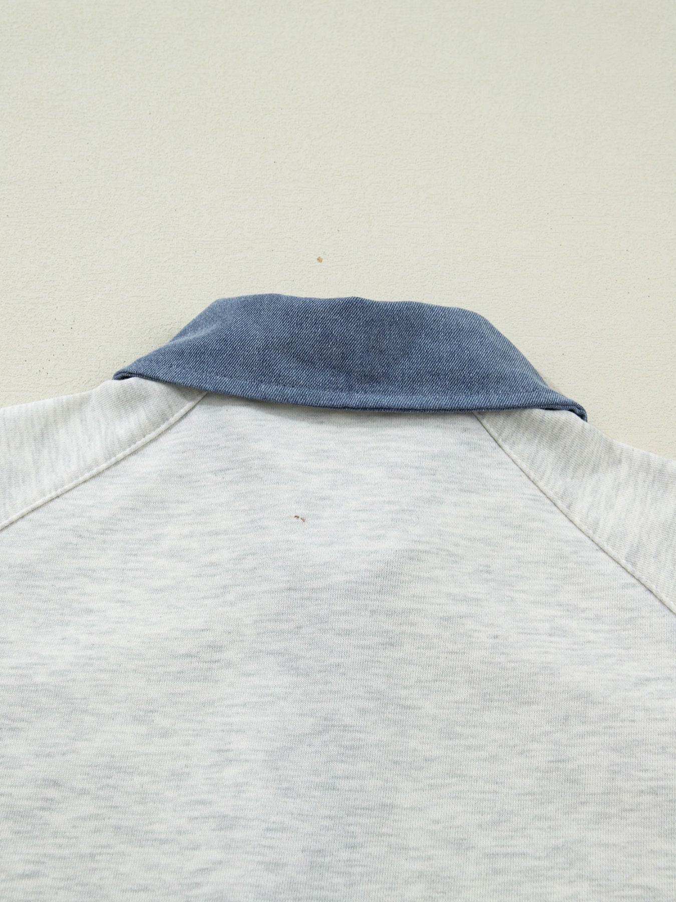 Contrast Trim Button Detail Top with blue denim collar on light gray fabric by Trendsi