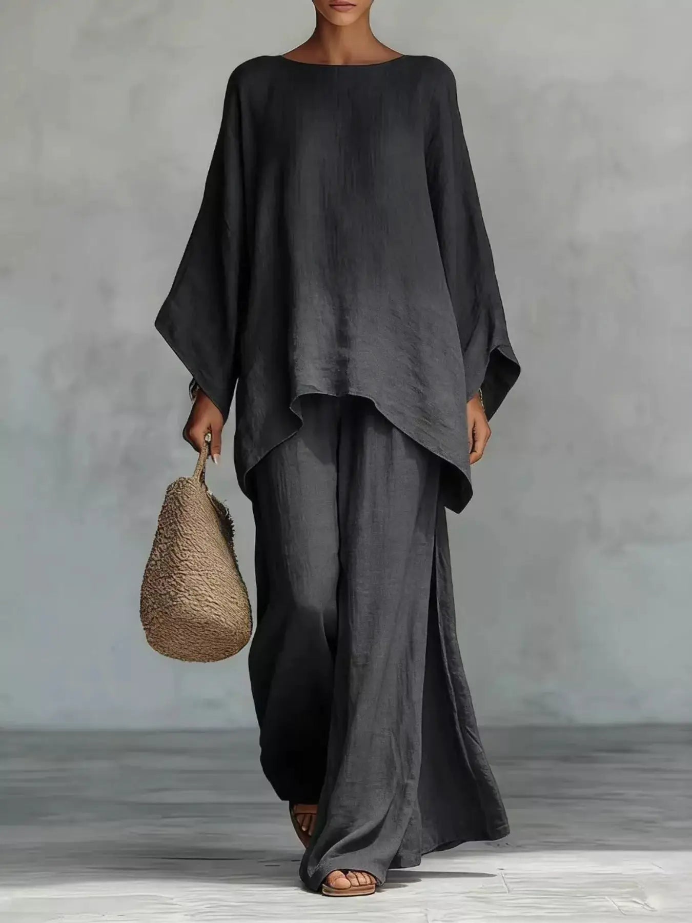 Plus Size Two-Piece Round Neck Top & Wide Leg Pants Set in charcoal gray; oversized tunic with wide sleeves.
