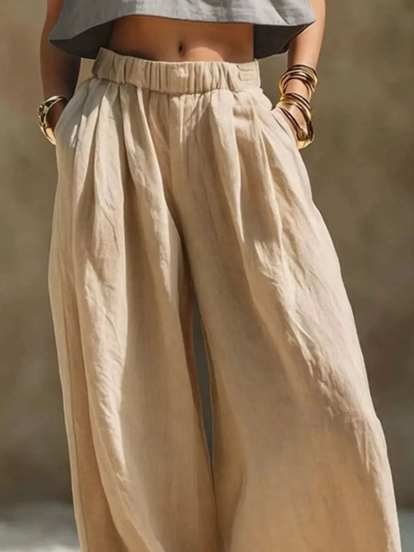 Wide-leg pants with elastic waistband in beige linen-look fabric, plus size.