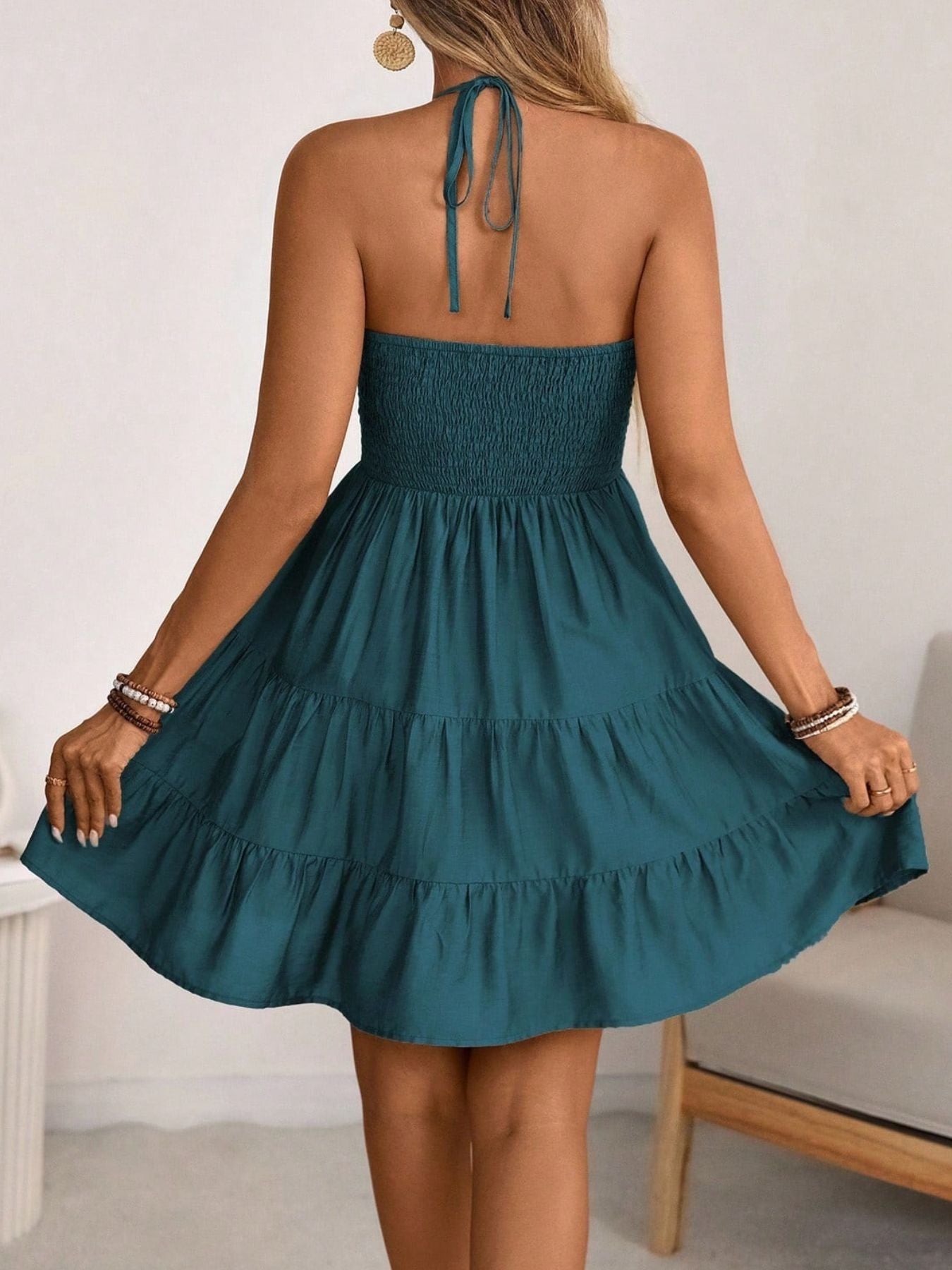 Smocked Halter Neck Tiered Dress in teal with back tie and ruffled tiers.