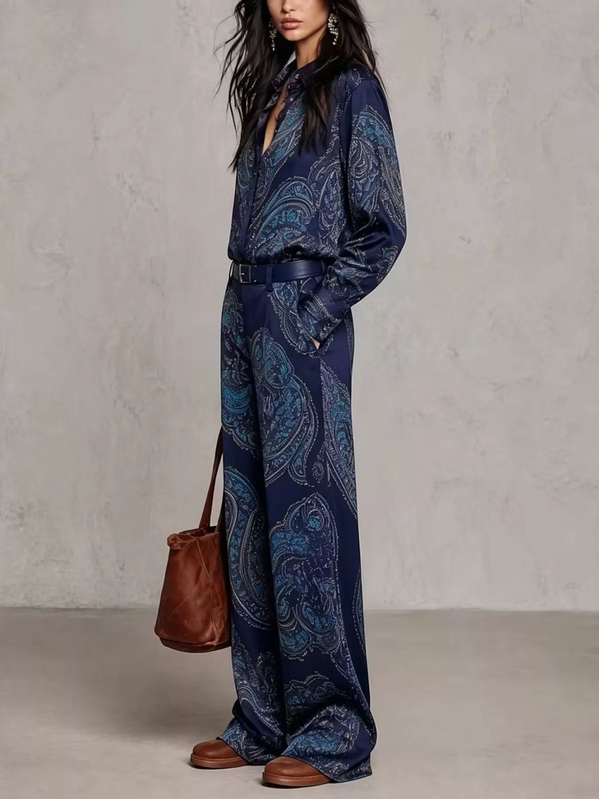 Side view of dark blue paisley shirt and wide-leg pants set