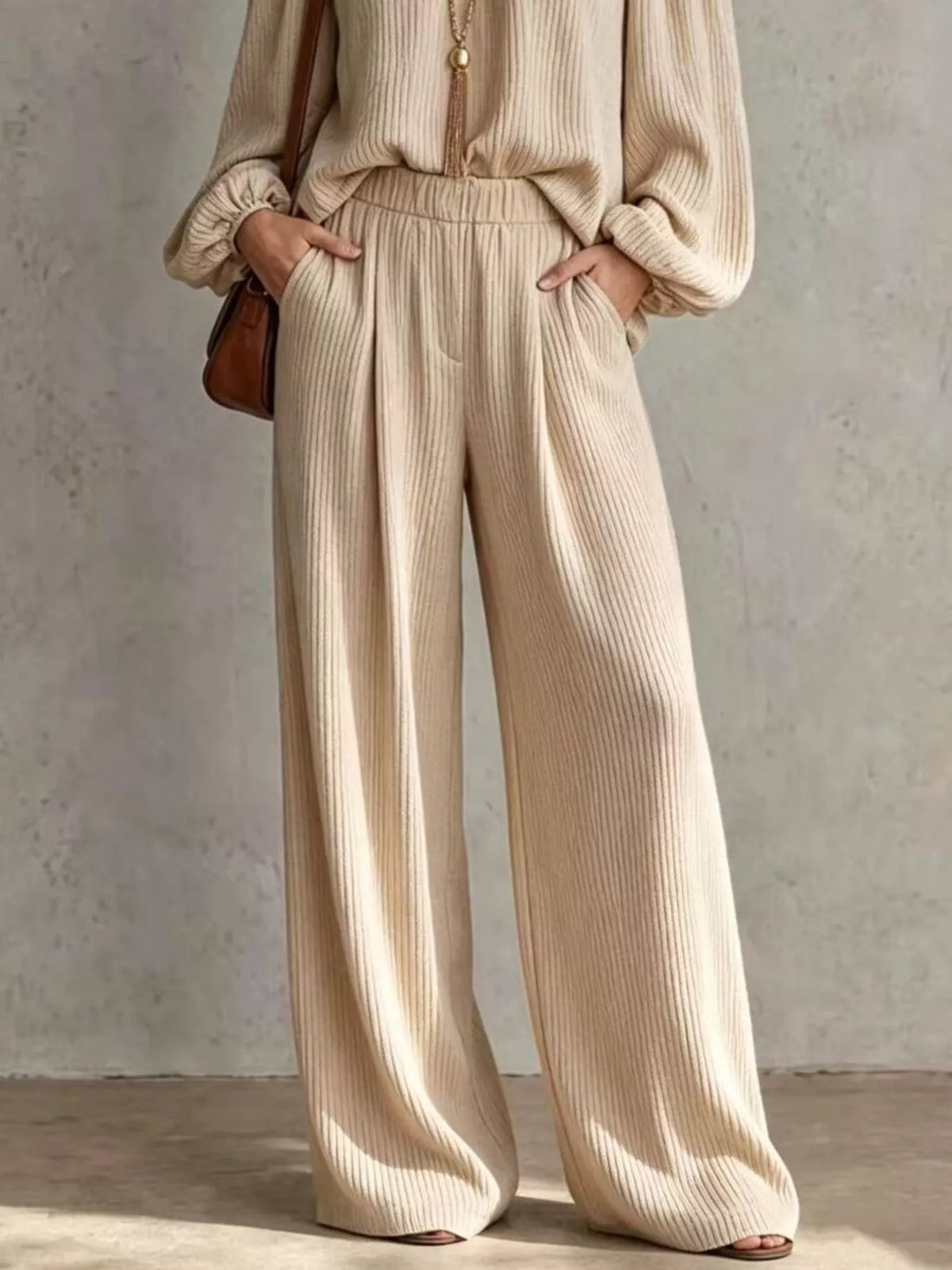 Off-Shoulder Crisscross Top & Wide-Leg Pants Set by Belle Bijouix – view 3 of 12