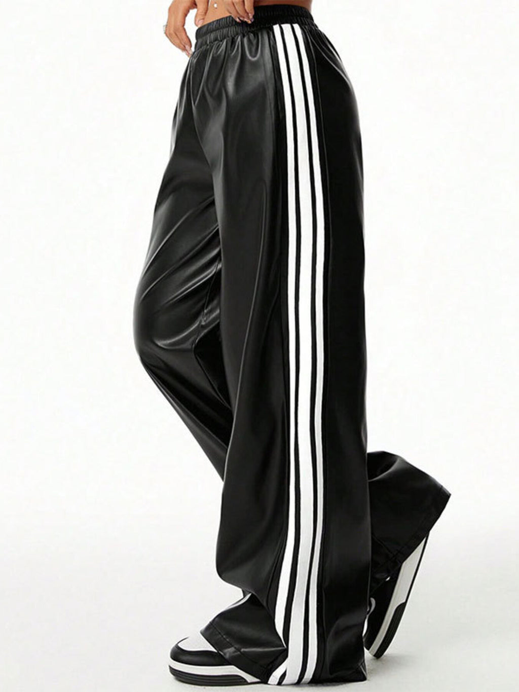 Striped wide-leg pants in black with white side stripes