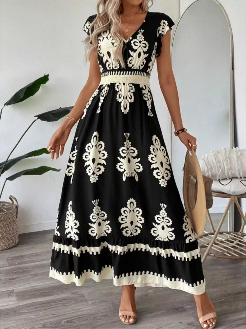 Printed V-Neck Ruffled Cap Sleeve Dress in black and ivory with ornate motif and smocked waist
