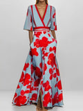 Floral Print Half-Sleeve Maxi Dress with Pockets in blue with red flowers, by Trendsi