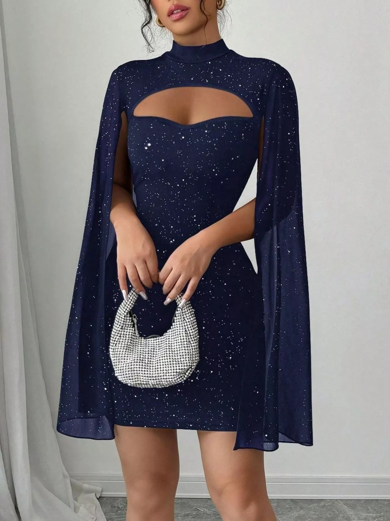Cutout Bodycon Mini Dress with Cape Sleeves in navy glitter by Belle Bijouix