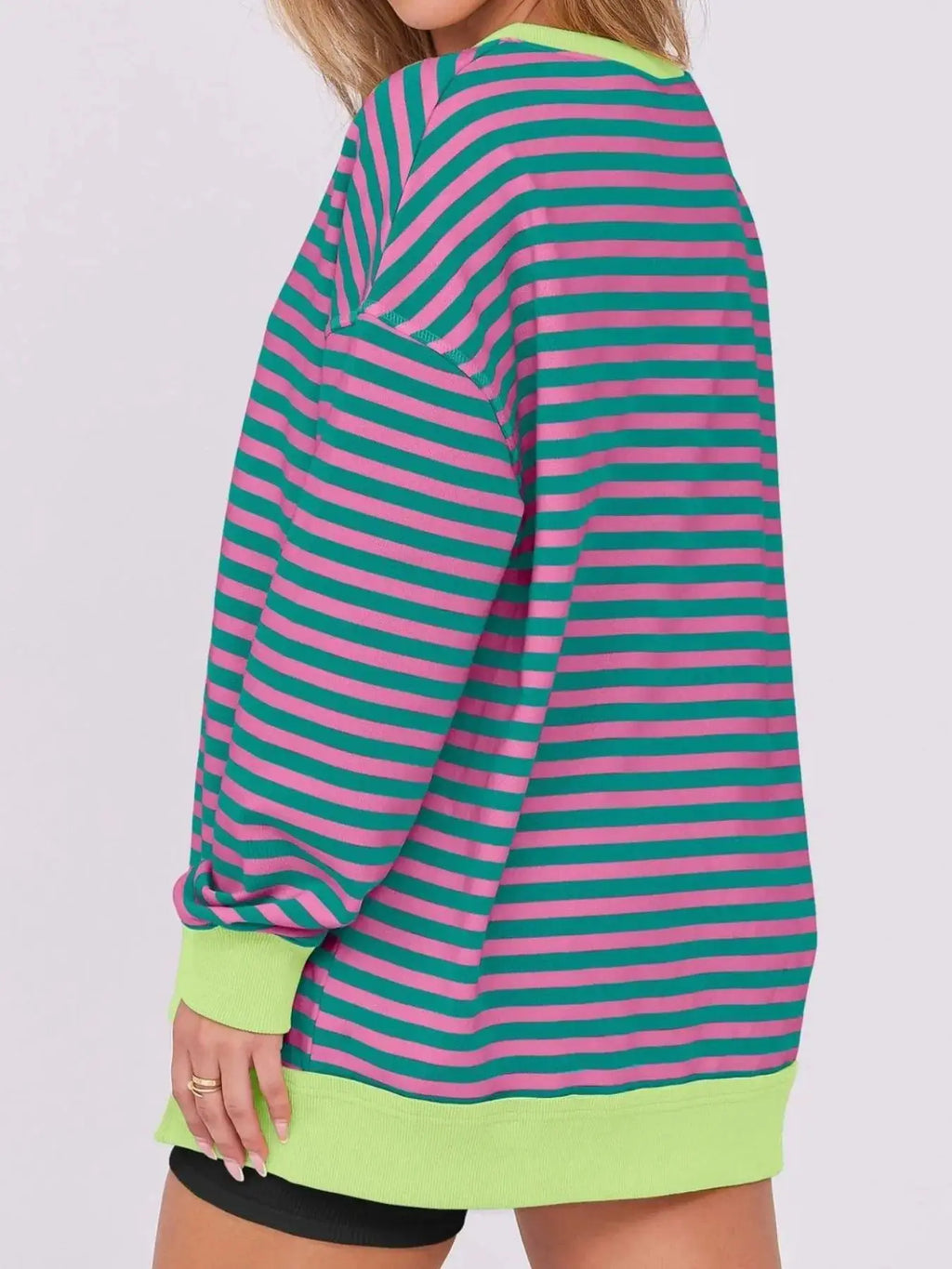 Notched Long Sleeve Oversized Sweatshirt in pink and teal stripes with neon lime green cuffs and hem