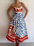 Sardine Print Spaghetti Strap Midi Dress in white with blue fish print and red border hem; thin red straps