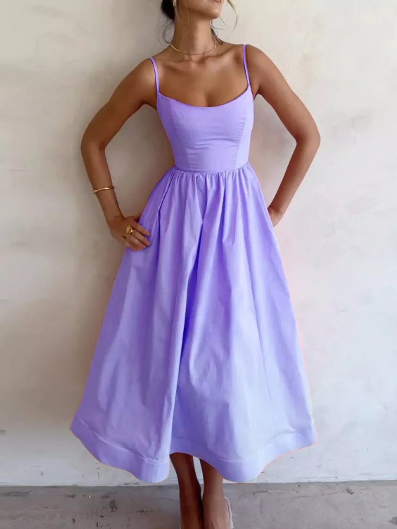 Adjustable strap scoop-neck lavender midi dress with a full gathered skirt.