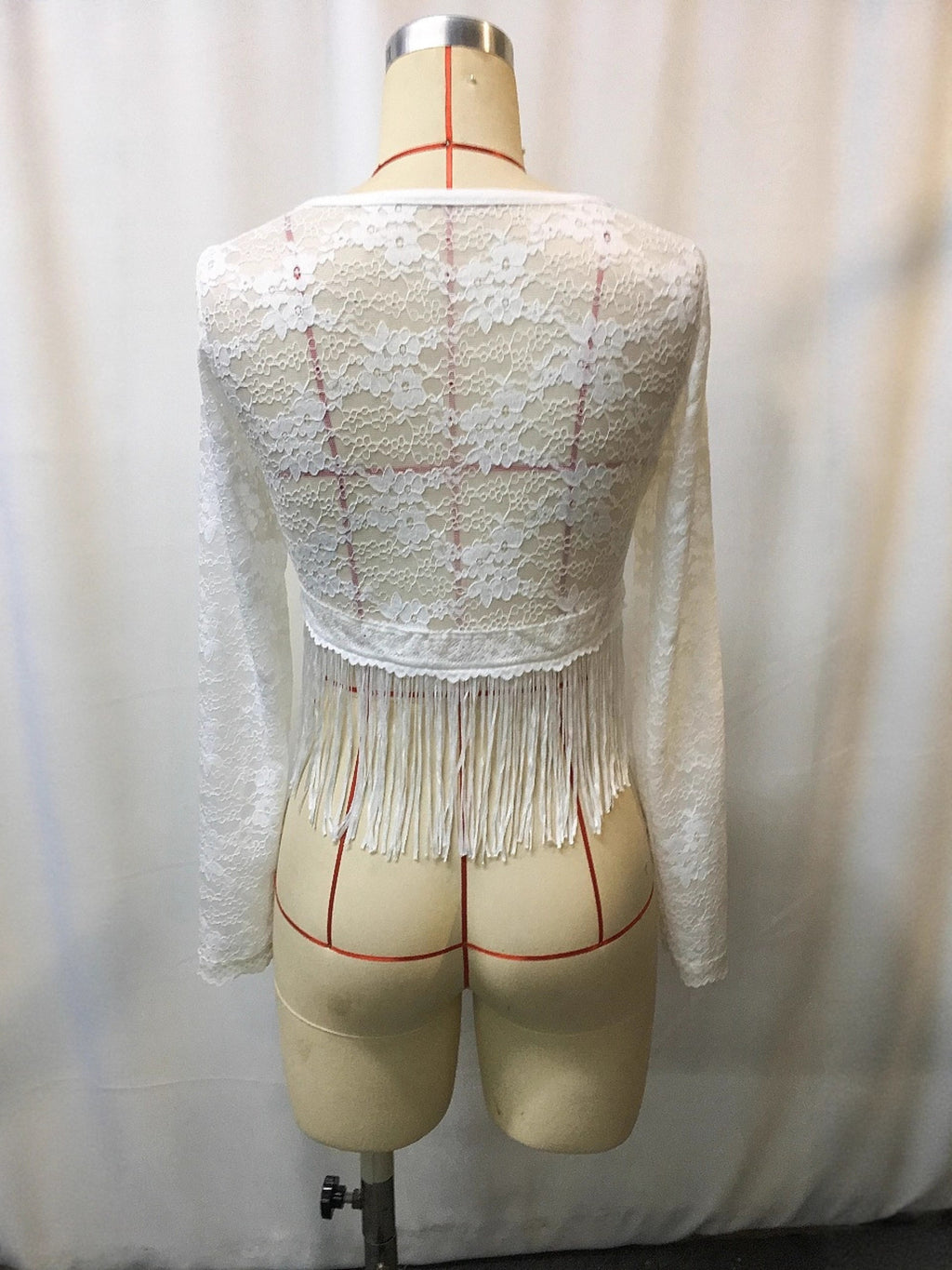 Plus-size white lace long-sleeve top with fringe hem by Trendsi