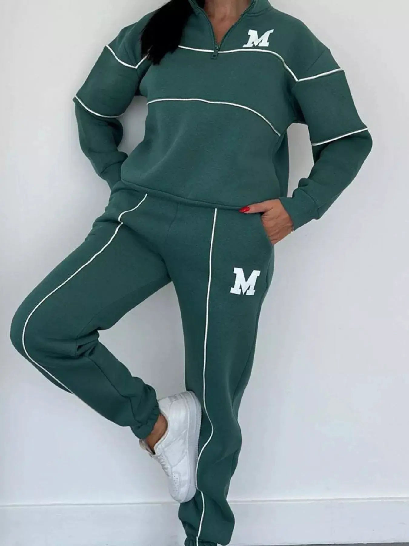 Plus-size striped quarter-zip top and pants set by Belle Bijouix, green with white piping and M logo