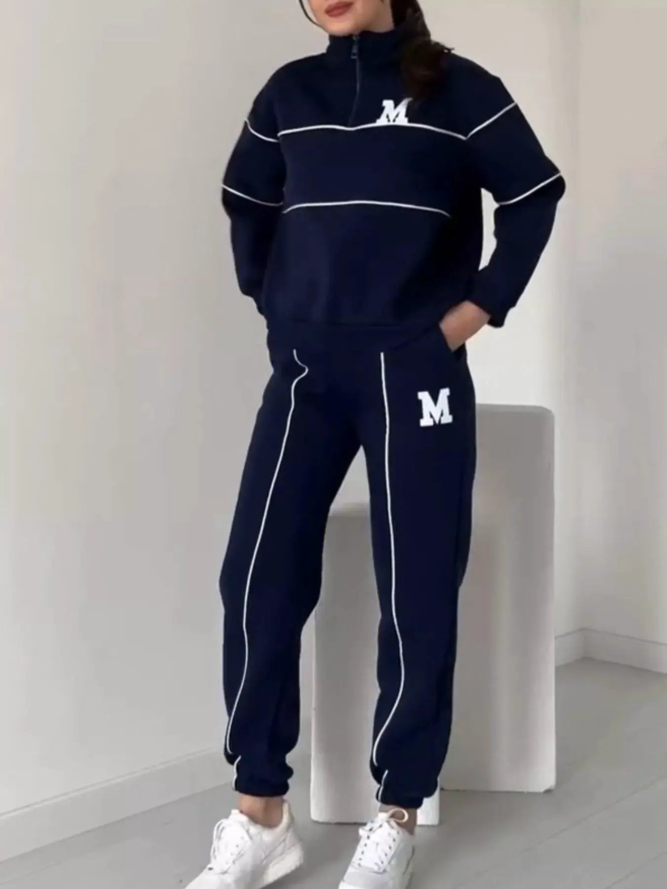 Full Size Striped Quarter Zip Top and Pants Set Plus Size, navy with white piping and M logo.