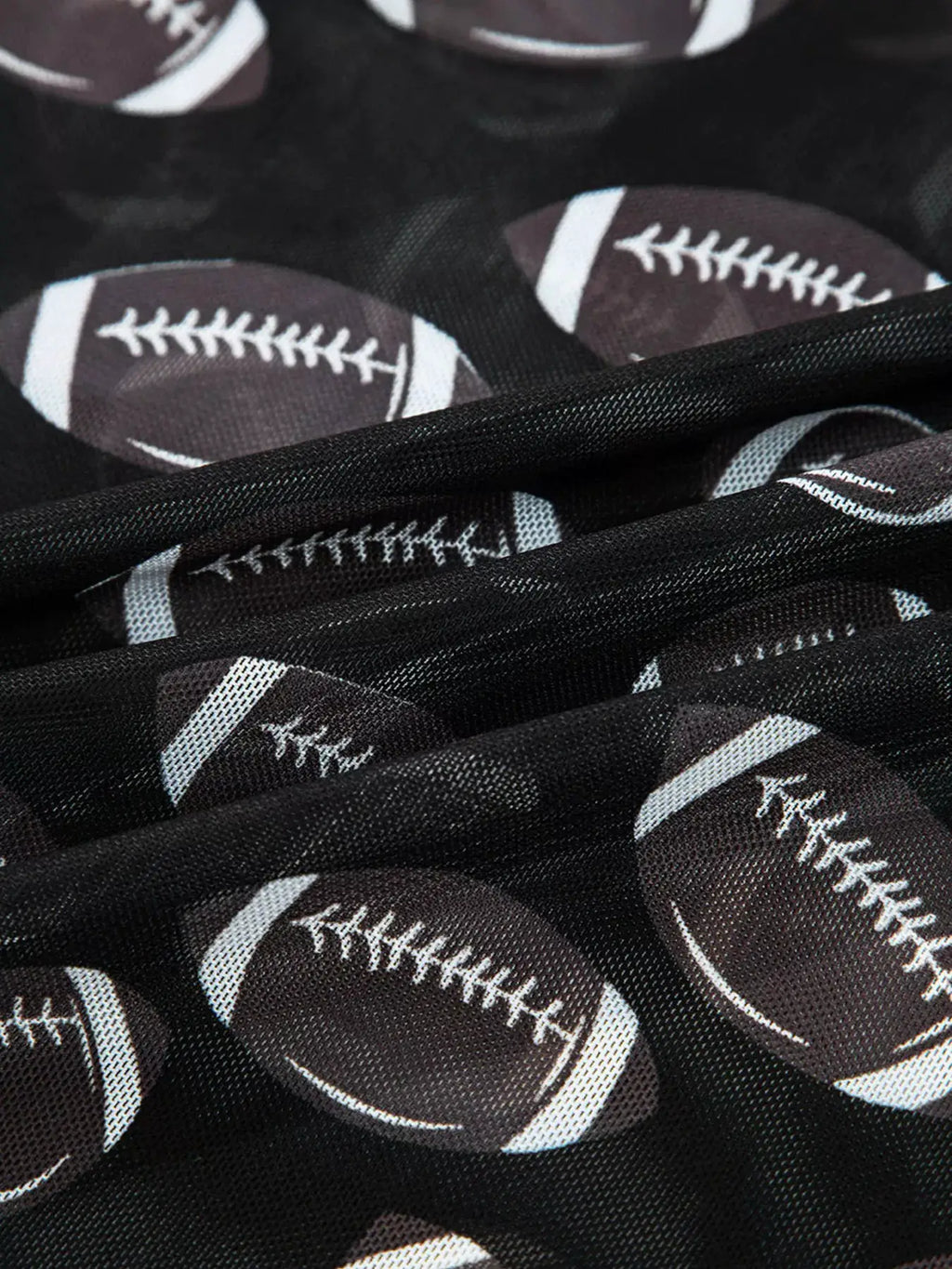 Game Day Mesh Sheer Long Sleeve Top by Belle Bijouix in black mesh with football-pattern print