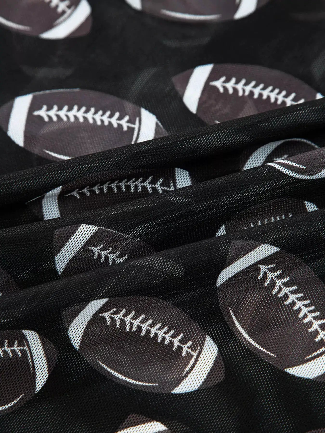 Game Day Mesh Sheer Long Sleeve Top by Belle Bijouix in black mesh with football-pattern print