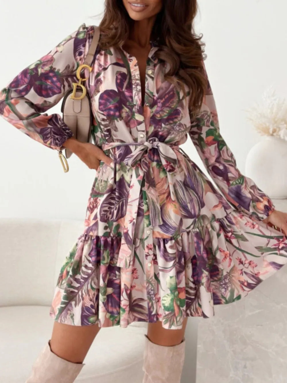 Belle Bijouix Ruffle Hem Floral Long Sleeve Dress in pastel floral print with tie waist