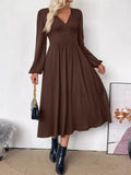 V-Neck Balloon Sleeve Midi Dress in brown with wrap bodice, long puff sleeves, and flowy A-line skirt by Trendsi.