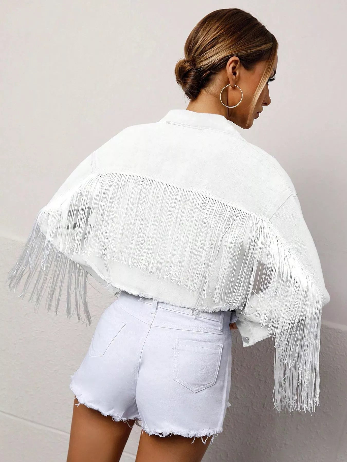 Fringed Cropped Denim Jacket by Trendsi in white denim with long fringe across back