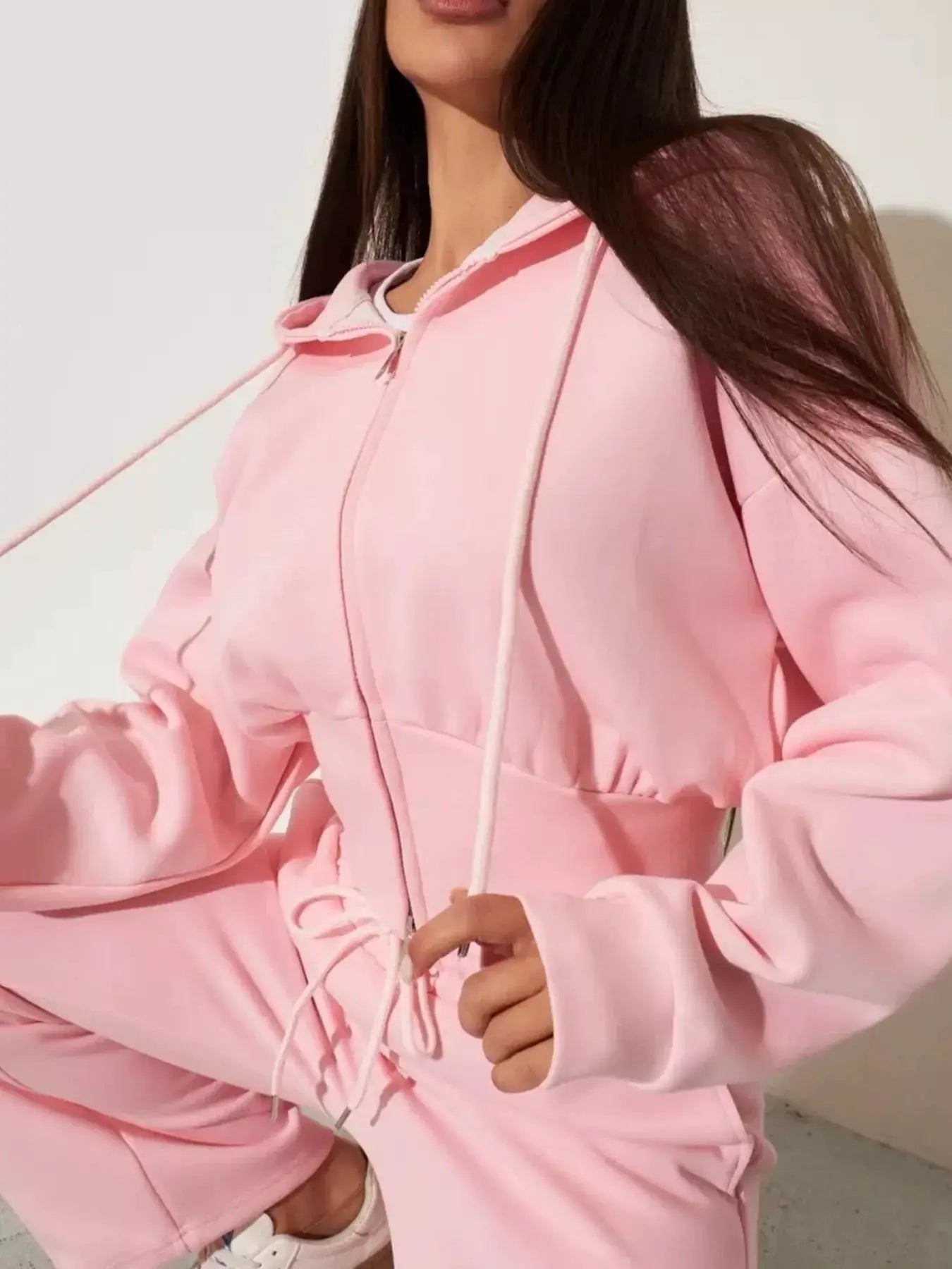 Pink zip-up hoodie and matching wide-leg lounge pants set, women's active wear
