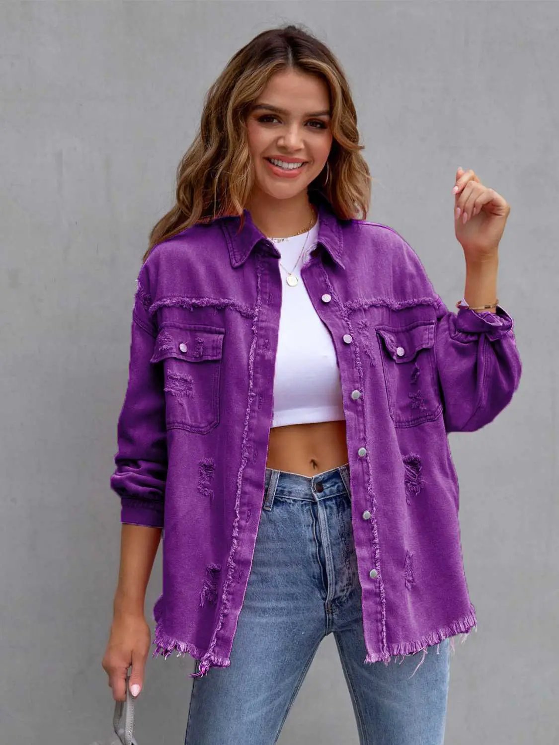 Distressed drop-shoulder purple denim jacket with frayed edges and chest pockets by Belle Bijouix