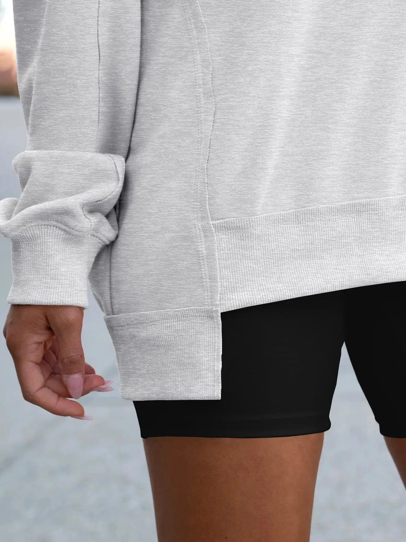 Notched long sleeve oversized sweatshirt in light gray with ribbed cuffs and hem