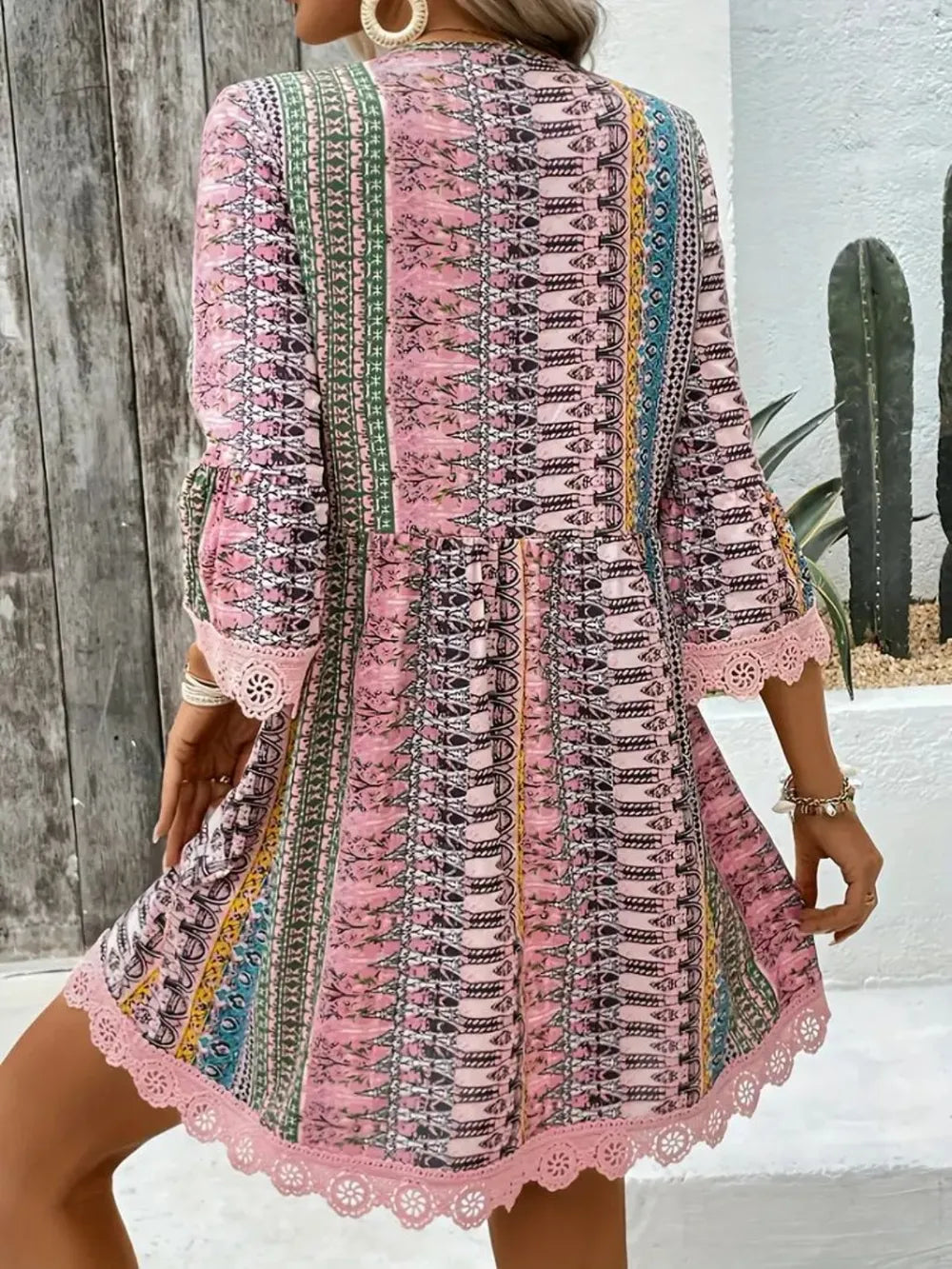 Lace Trim Printed V-Neck 3/4 Sleeve Dress by Belle Bijouix; pink boho pattern with lace hem and cuffs.