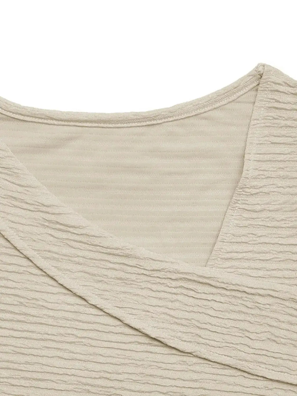 Asymmetrical Short Sleeve Top in cream crinkle fabric.