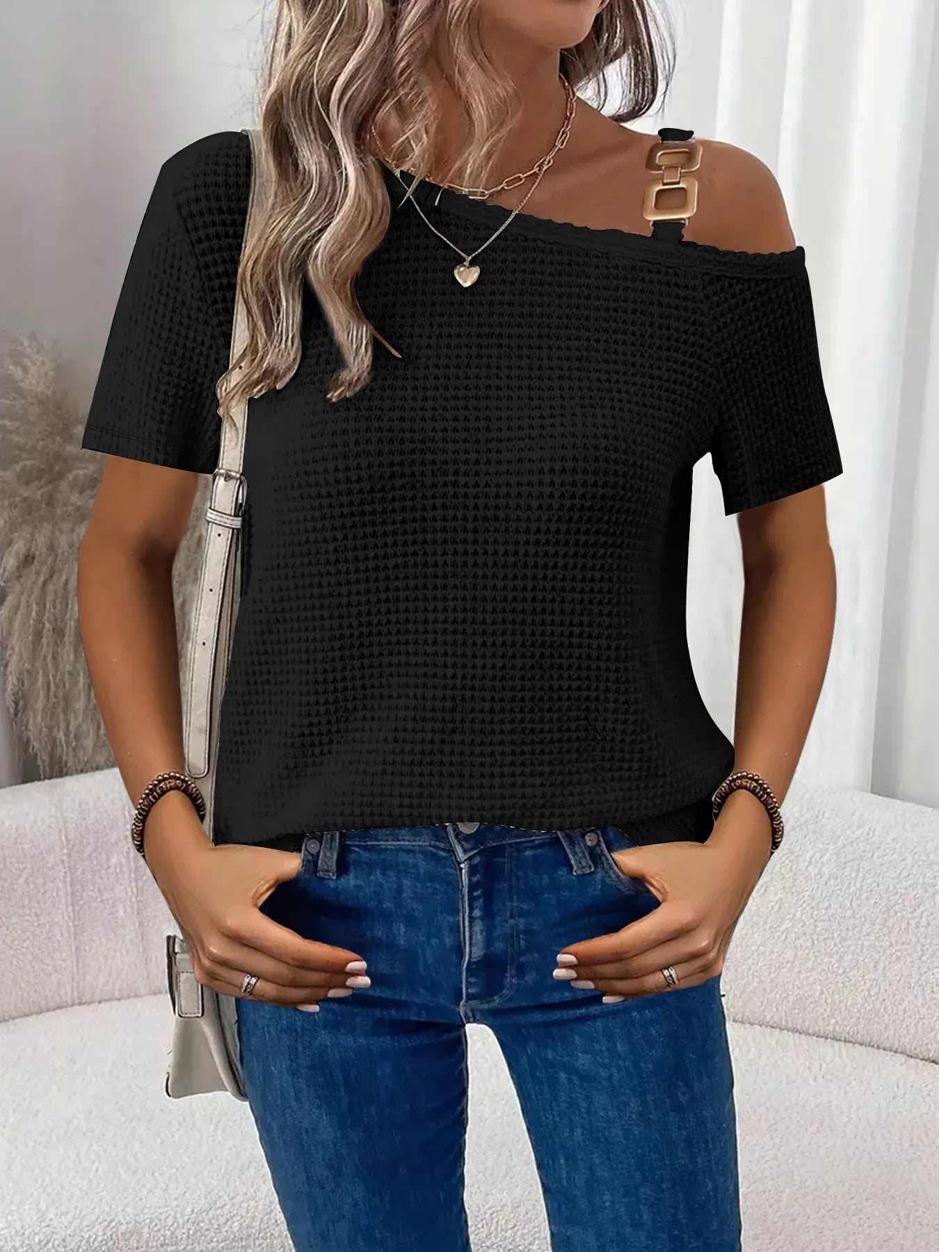 Trendsi one-shoulder chain-detail waffle-knit T-shirt in black with gold shoulder chain accent for a chic casual look.