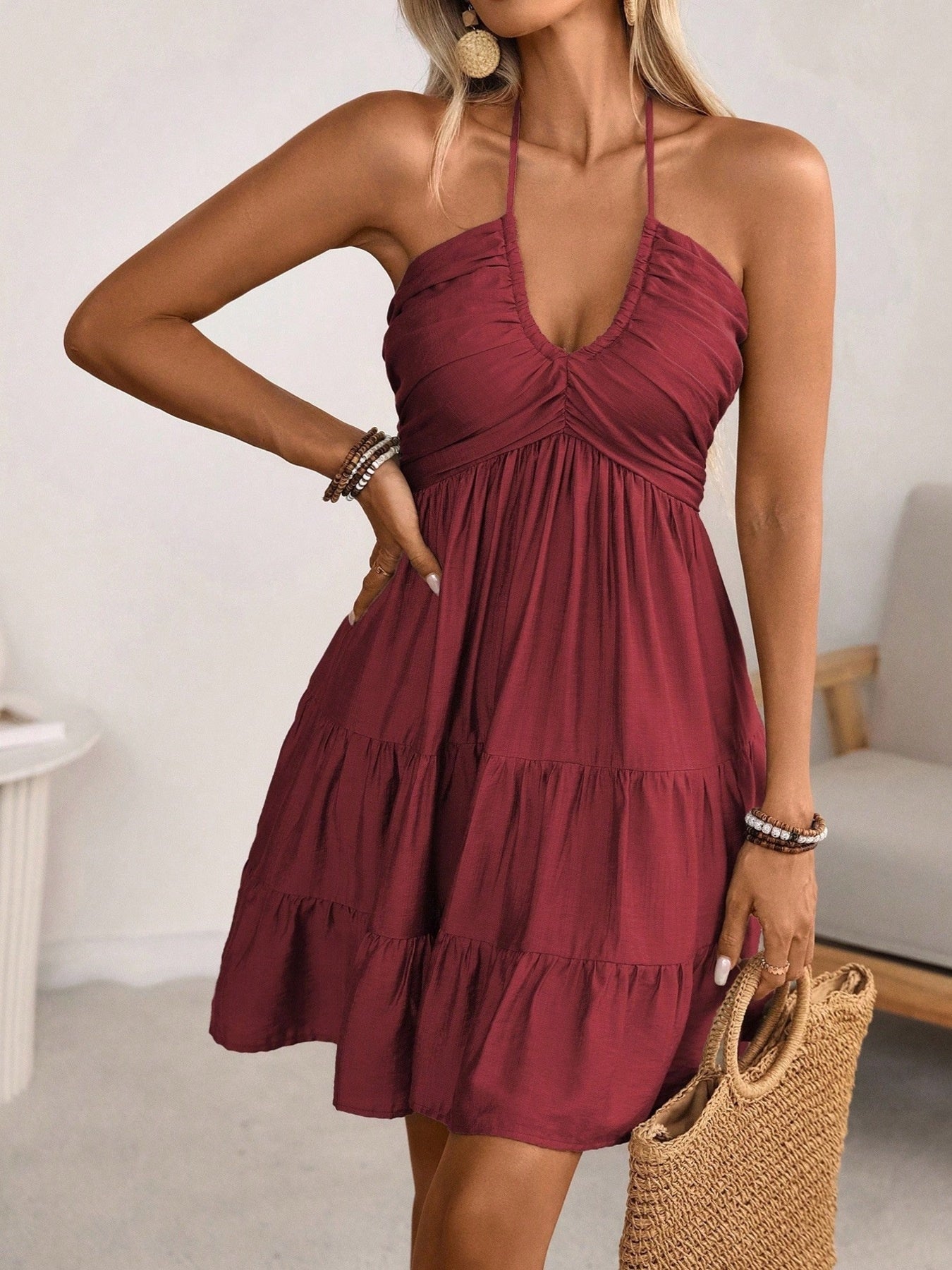 Smocked Halter Neck Tiered Dress in burgundy with ruched bust and flowing skirt