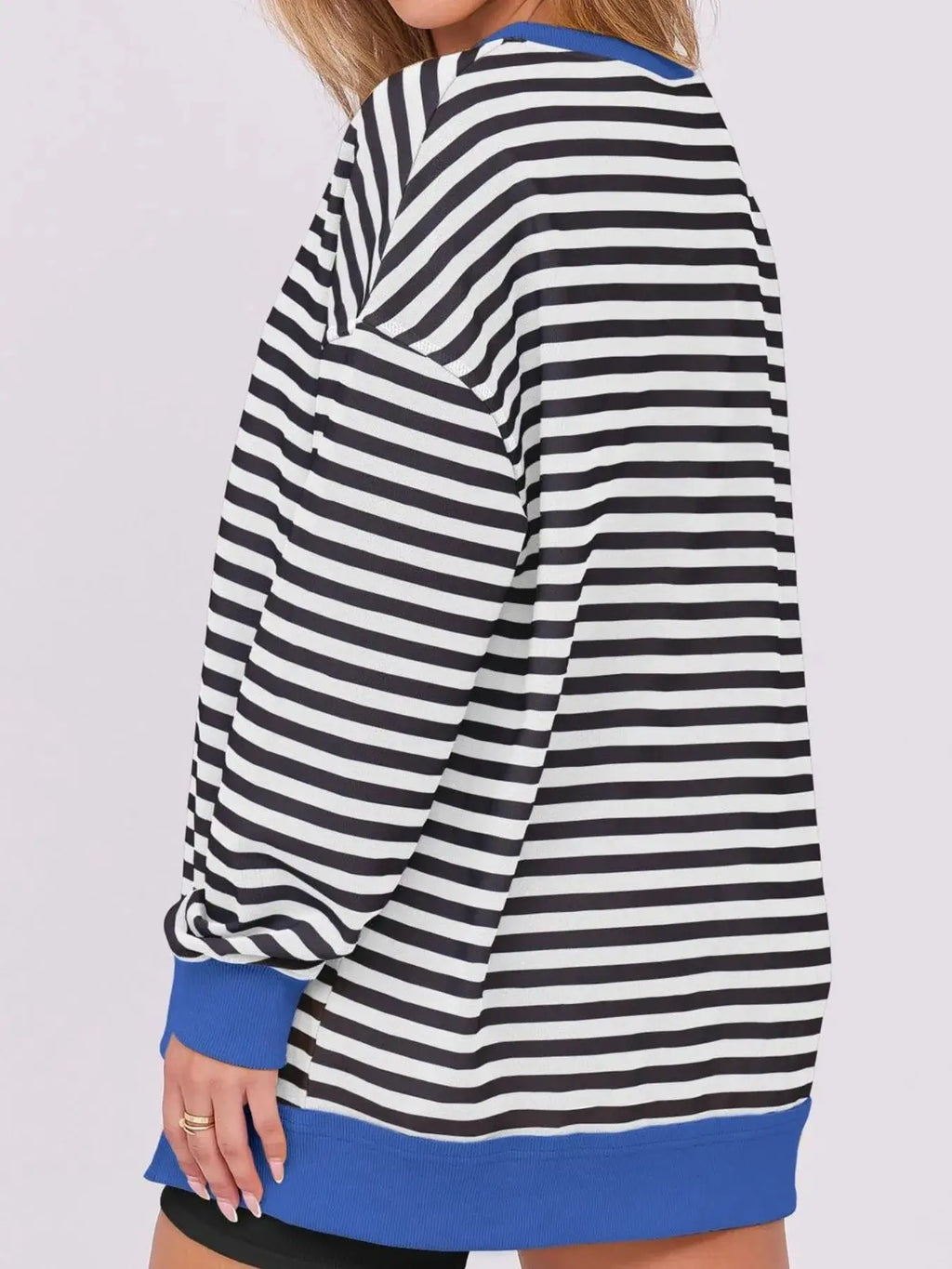 Notched Long Sleeve Oversized Sweatshirt in black and white stripes with blue ribbed cuffs and hem