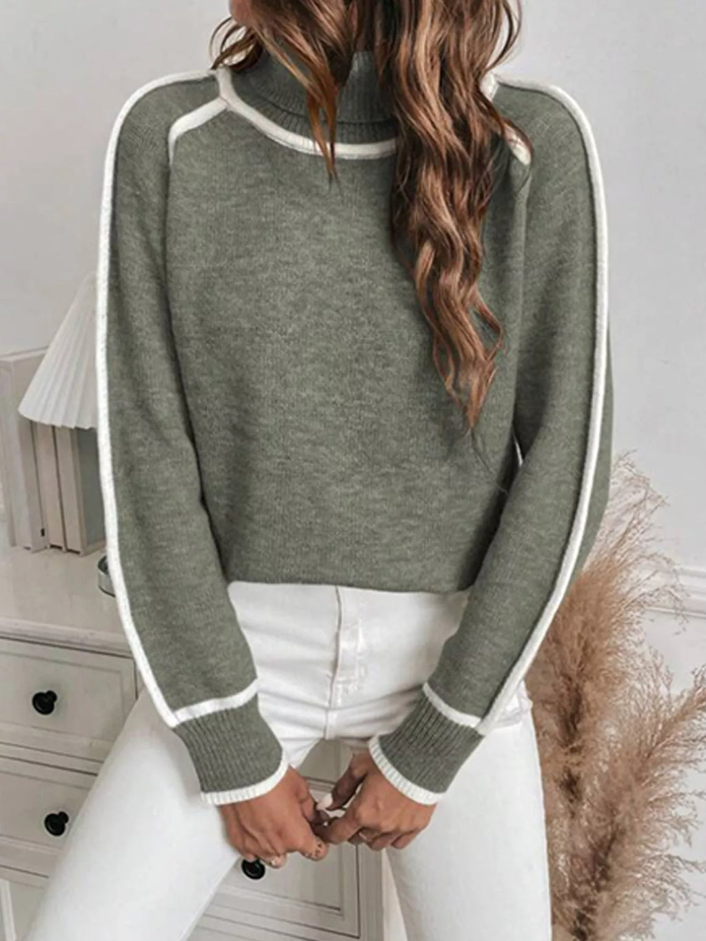 Front view of military green turtleneck sweater with white contrast trim