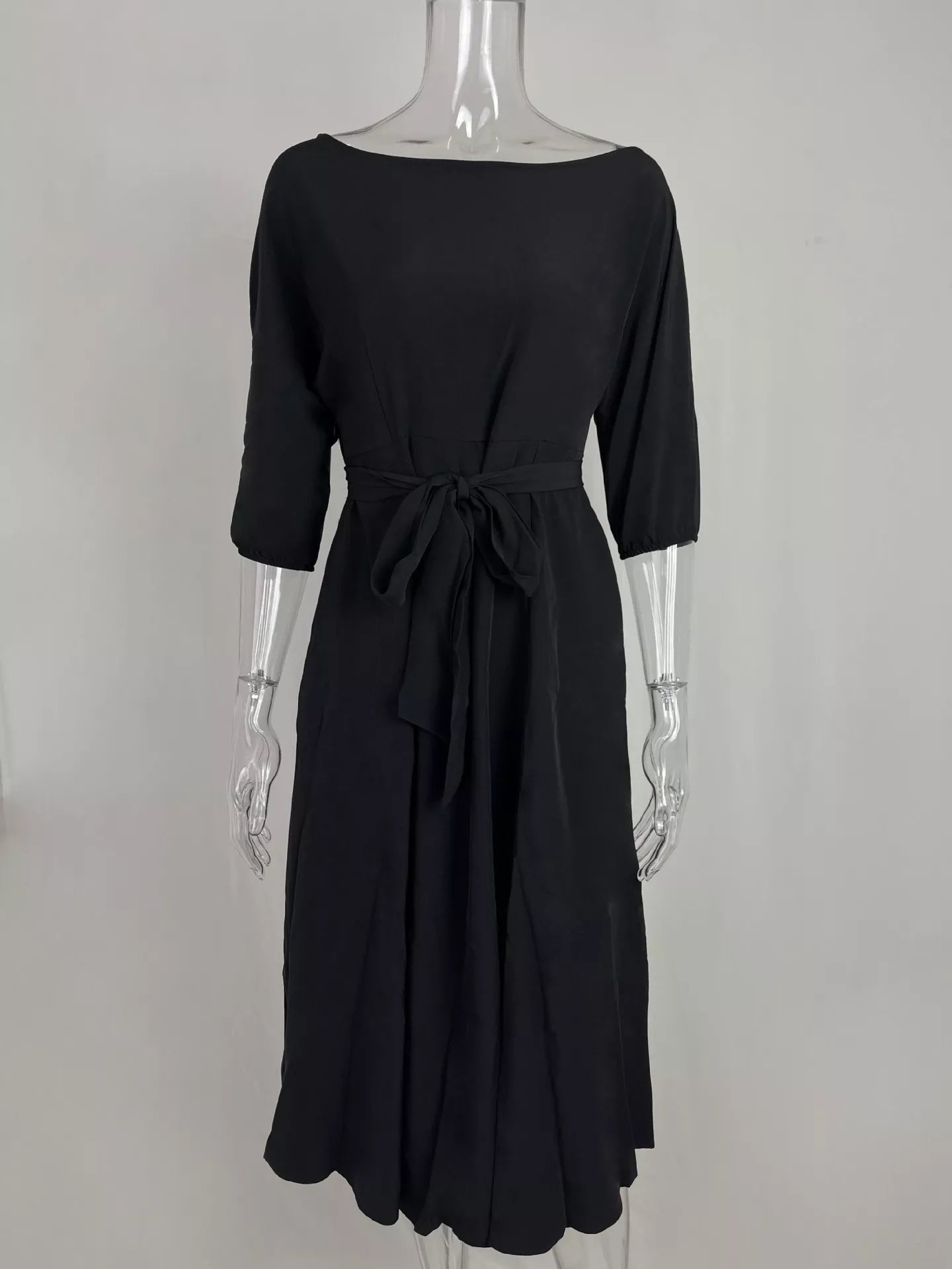 Boat Neck Tie Waist Dress in black with waist sash and three-quarter sleeves