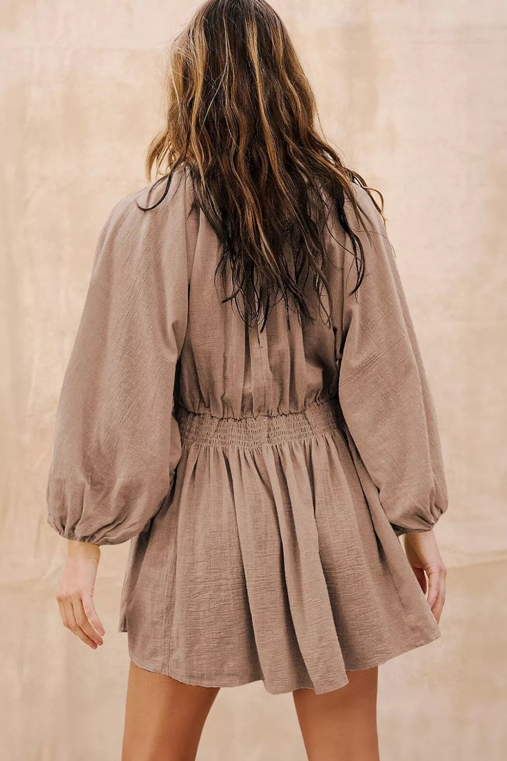 Smocked V-Neck Balloon Sleeve Dress in taupe; back view shows smocked waist and puff sleeves.