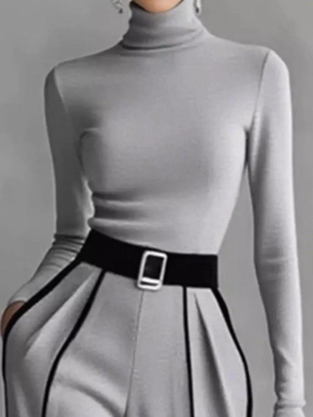 Trendsi turtleneck long-sleeve top and contrast gray pants set with black piping and belt buckle.