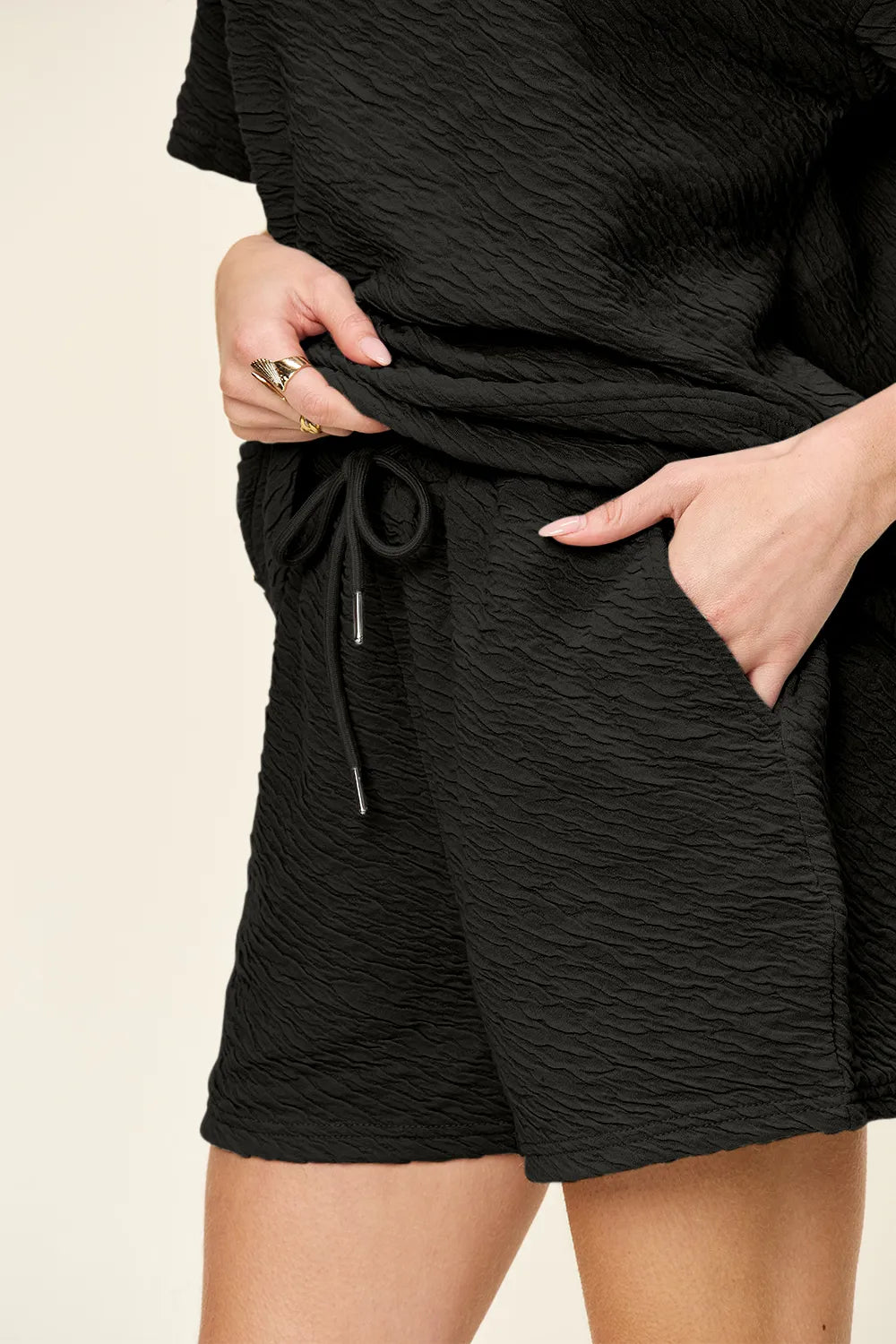 Belle Bijouix Double Take textured black sleepwear set with drawstring shorts featuring pockets