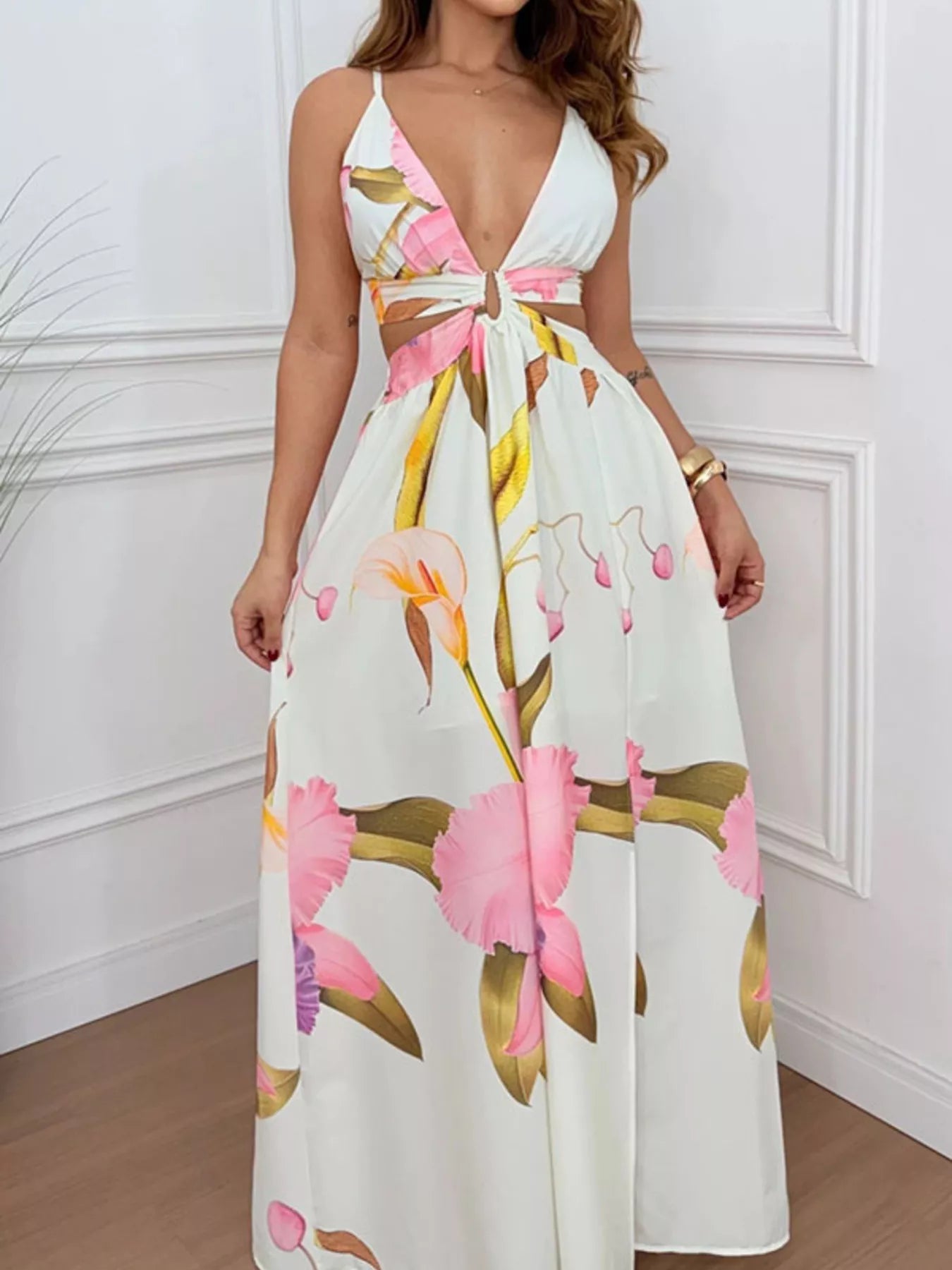 Tropical print plunge cutout slit maxi dress by Trendsi; white base with pink and yellow floral design