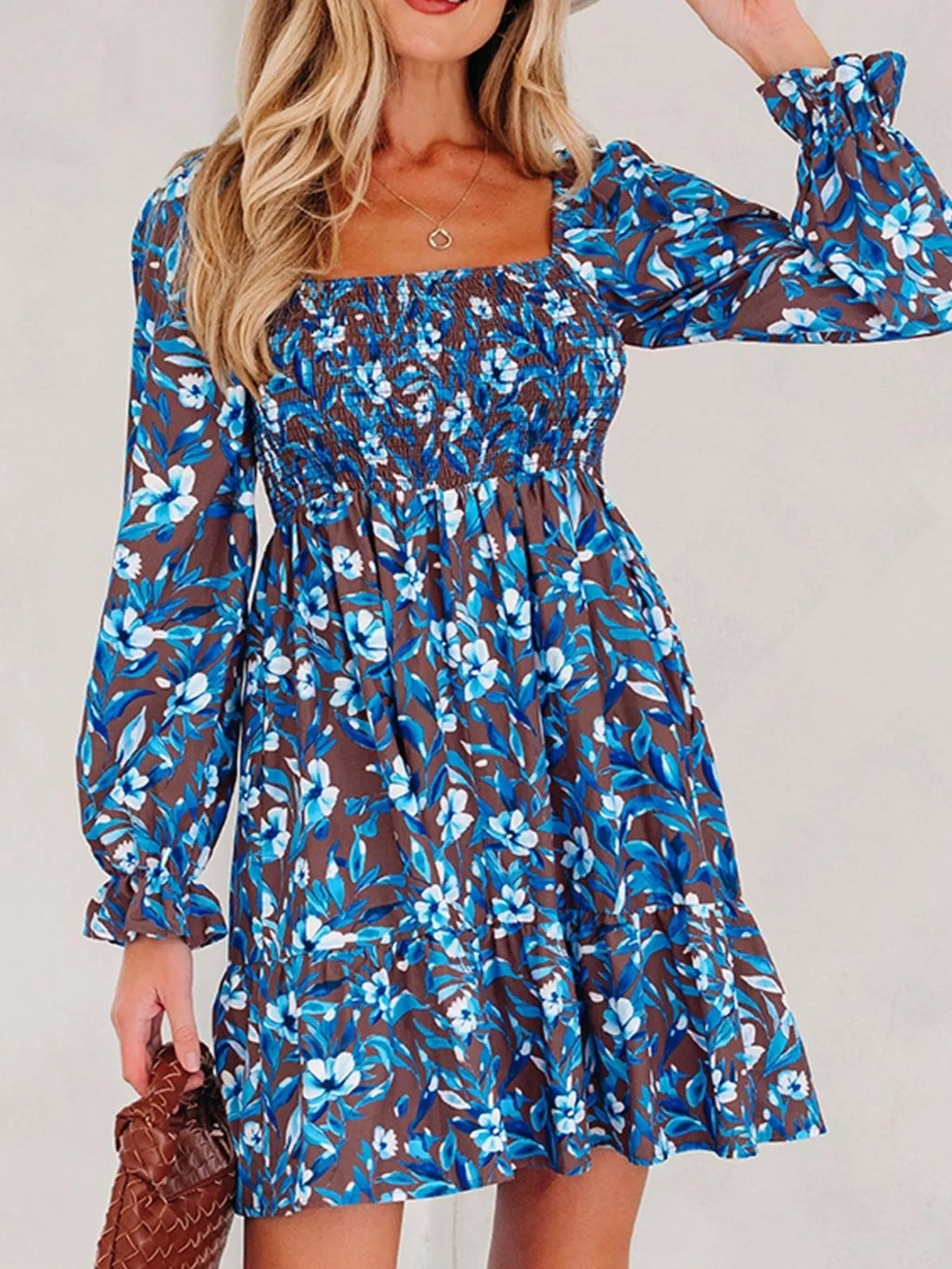 Smocked Bodice High Waist Ruffled Sleeve Floral Dress by Belle Bijouix in blue floral on brown background