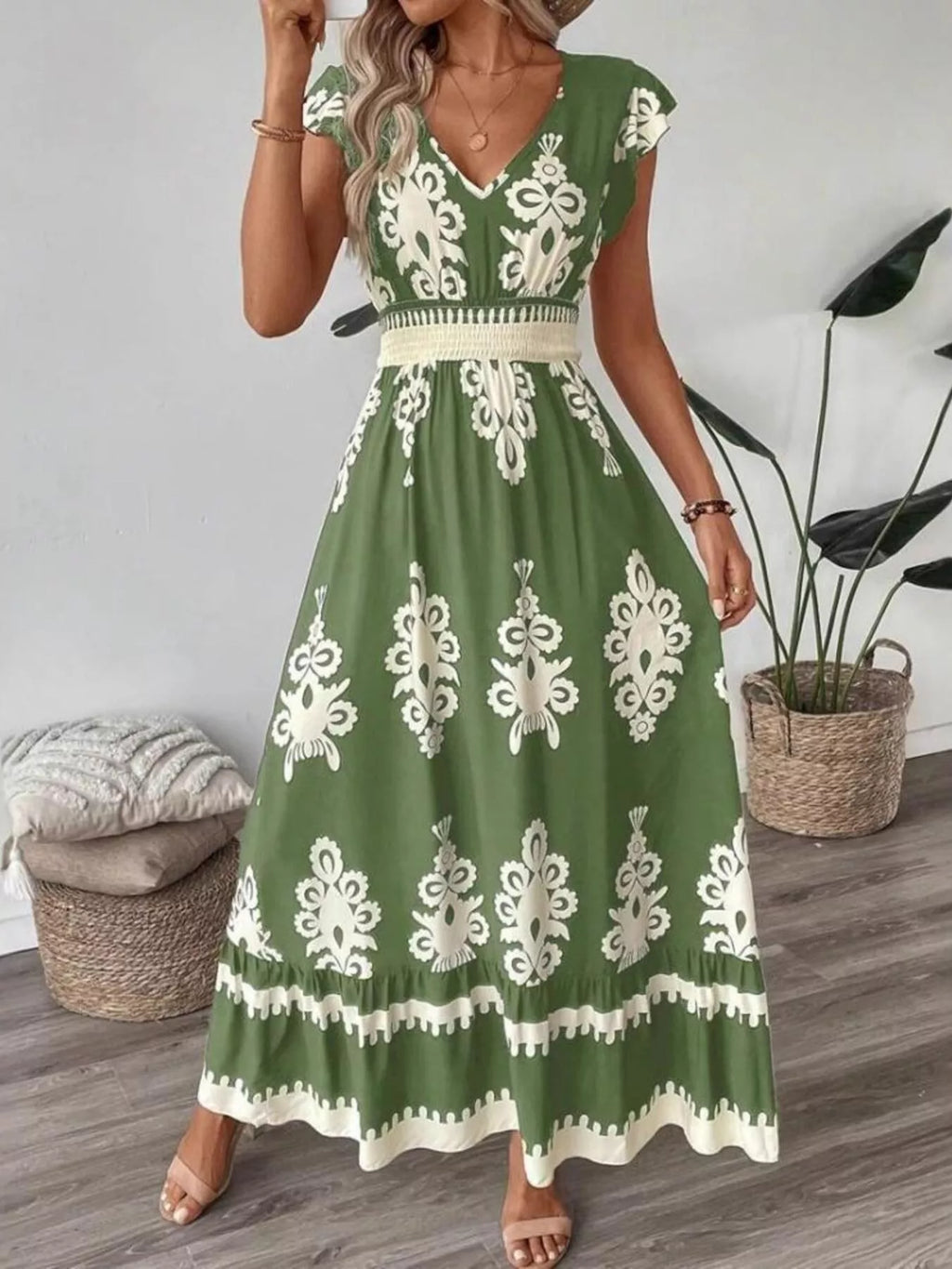 Printed V-Neck Ruffled Cap Sleeve Dress in green with white ornate print; smocked waist, Belle Bijouix.