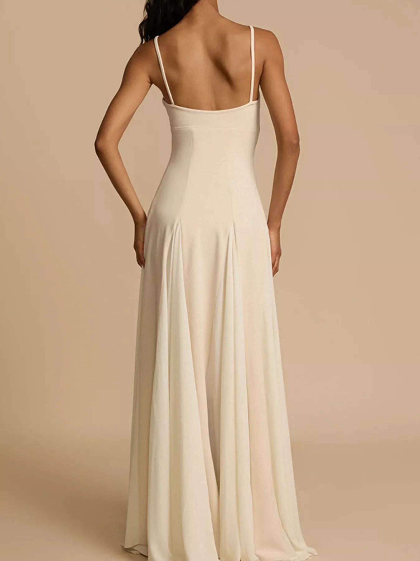 Sweetheart Neck Spaghetti Strap Flowy Maxi Dress by Trendsi in cream, back view.