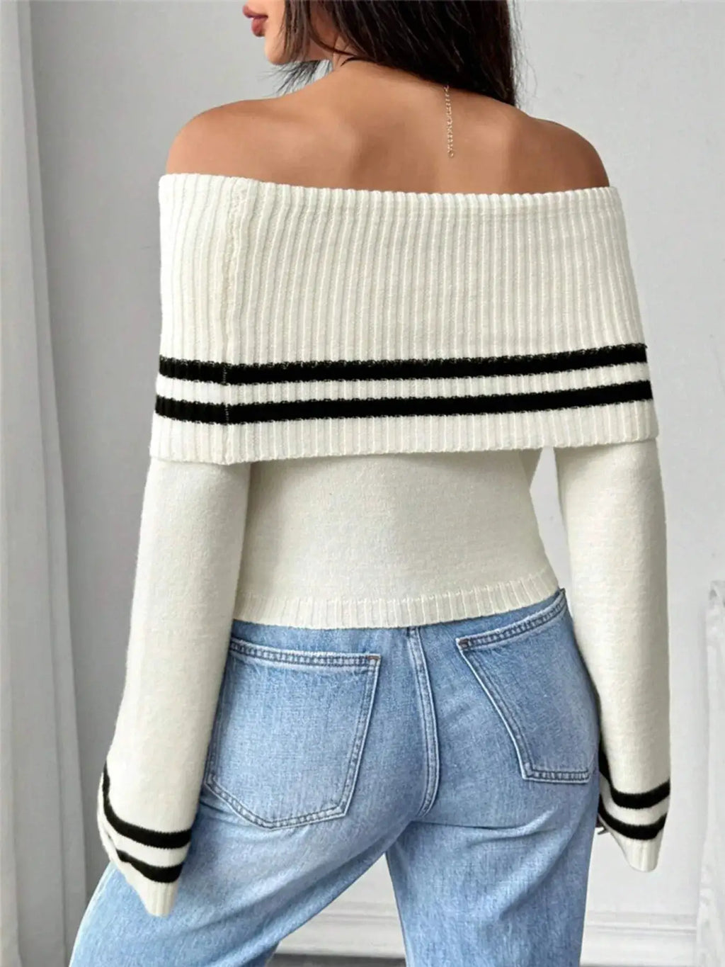 Ribbed Off-Shoulder Striped Knit Top by Belle Bijouix, white knit with black stripe trim.