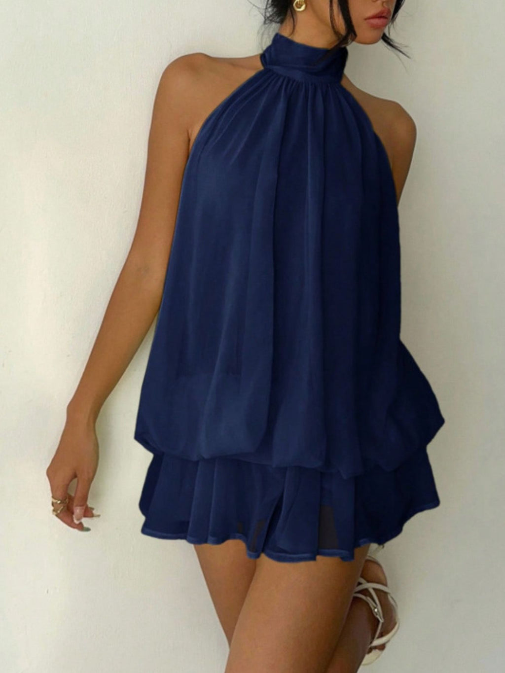 Halter Neck Layered Mini Dress in navy blue chiffon with tiered ruffles.