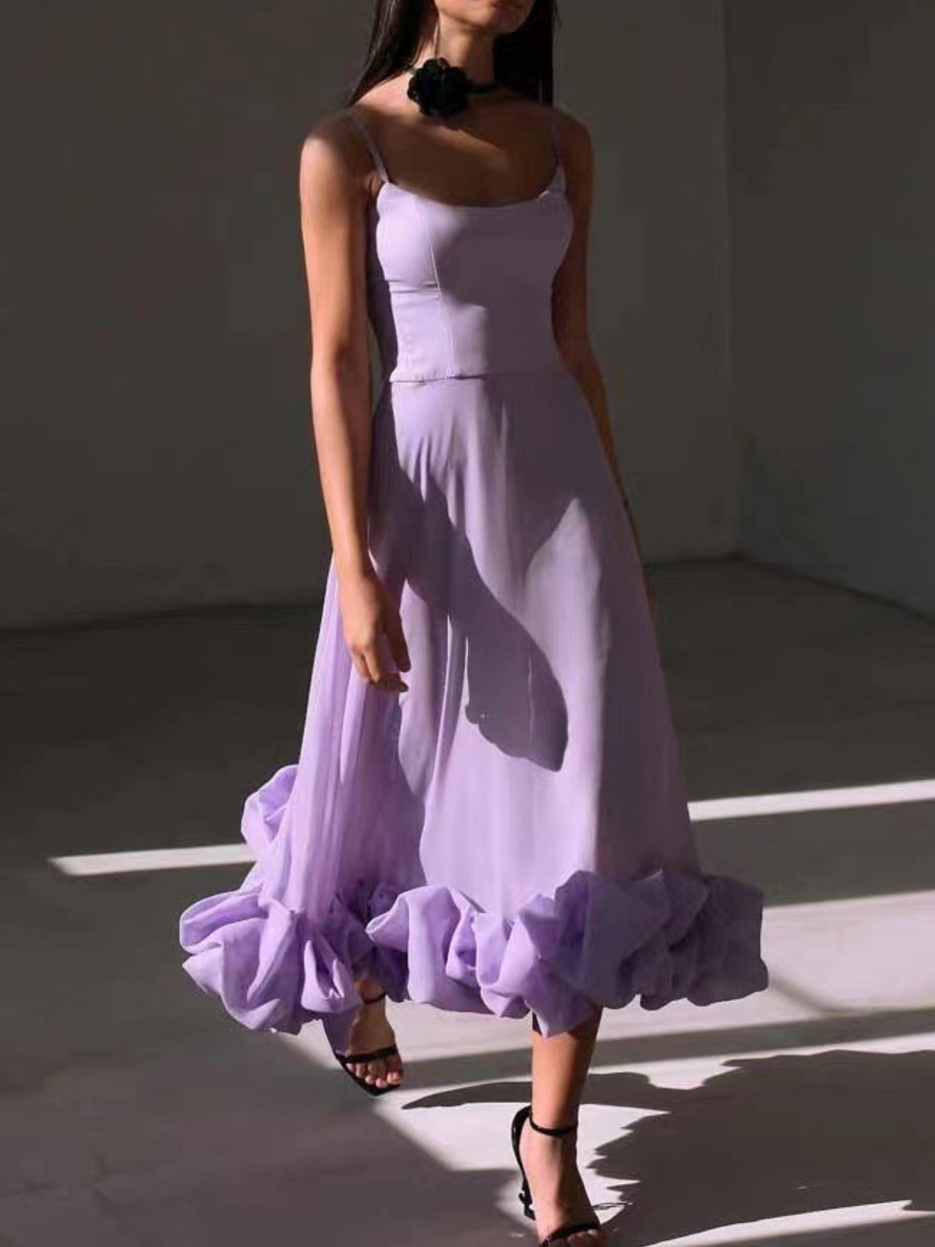 Ruffle Hem Scoop Neck Midi Dress in lavender with thin straps and a flowing ruffle-hem skirt.