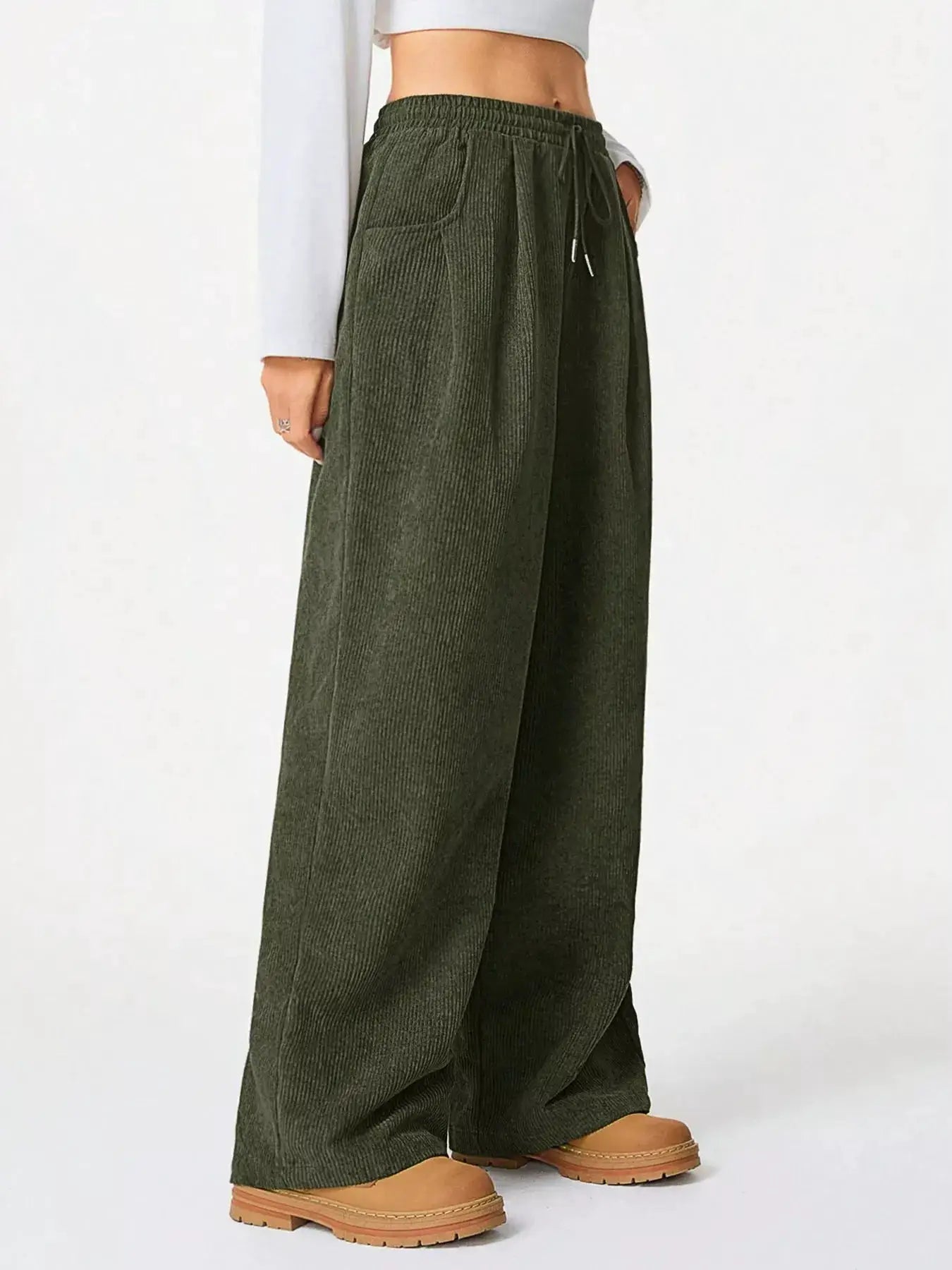 Casual corduroy wide-leg pants in olive green with drawstring waist and pockets