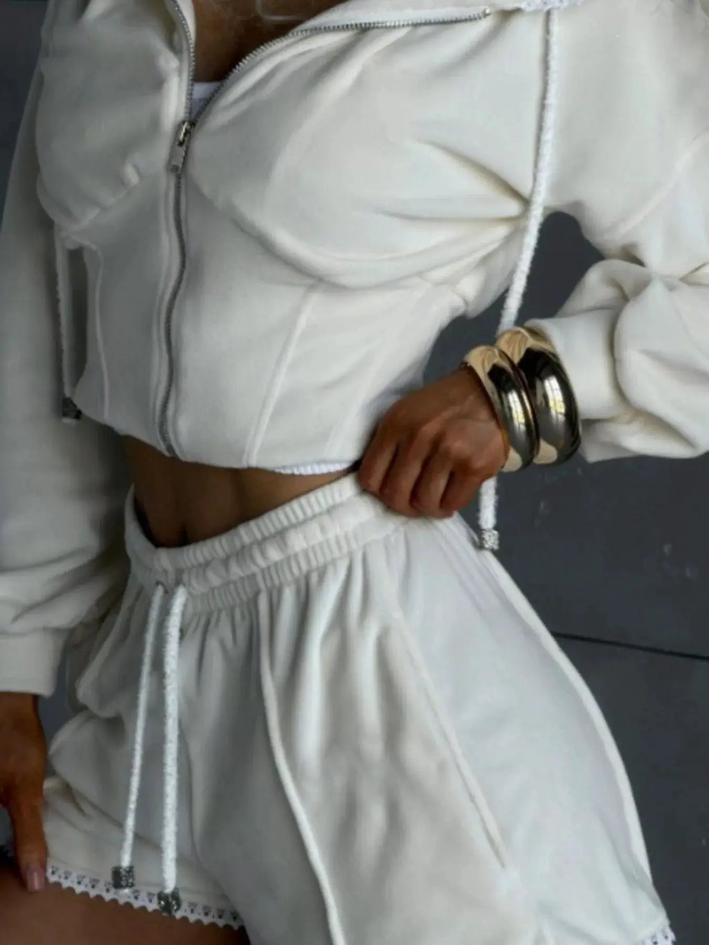Zip Up Hooded Outerwear and Shorts Set; cream two-piece activewear with zip hoodie, drawstring shorts, lace trim.
