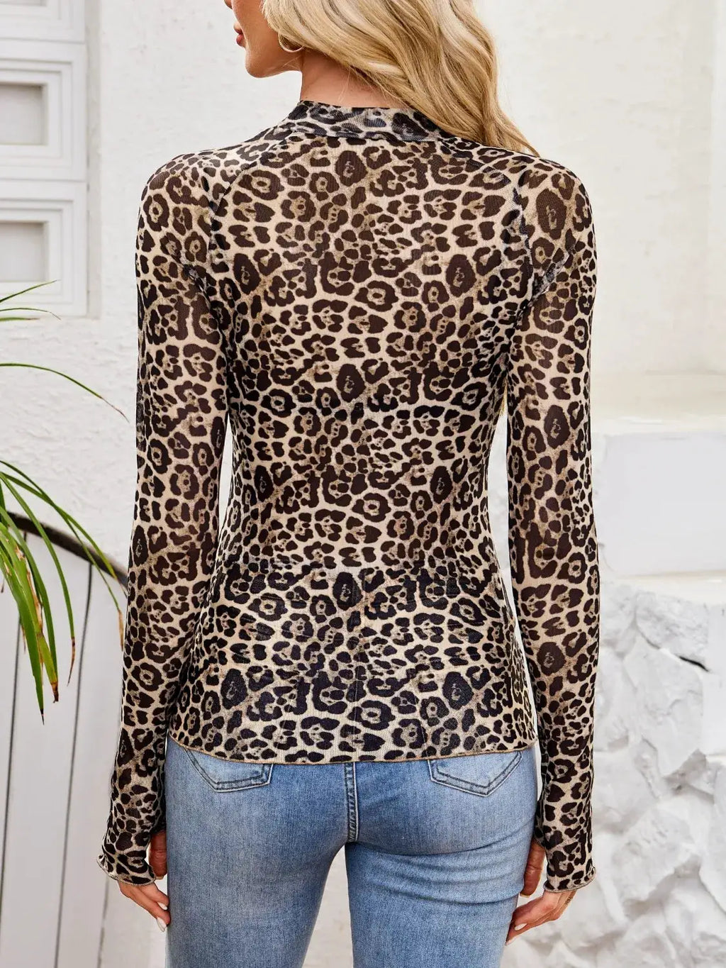 Floral mock neck long-sleeve top by Belle Bijouix in leopard print