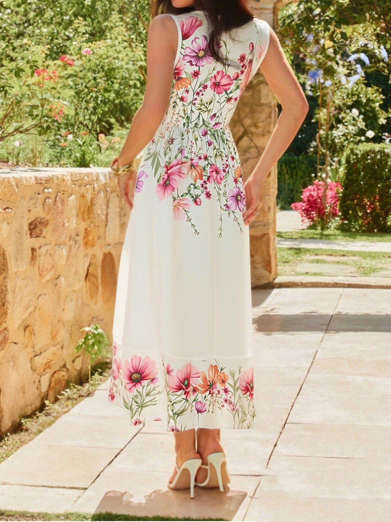Floral print square-neck dress in white with pink, purple, and orange flowers; knee-length with floral border.