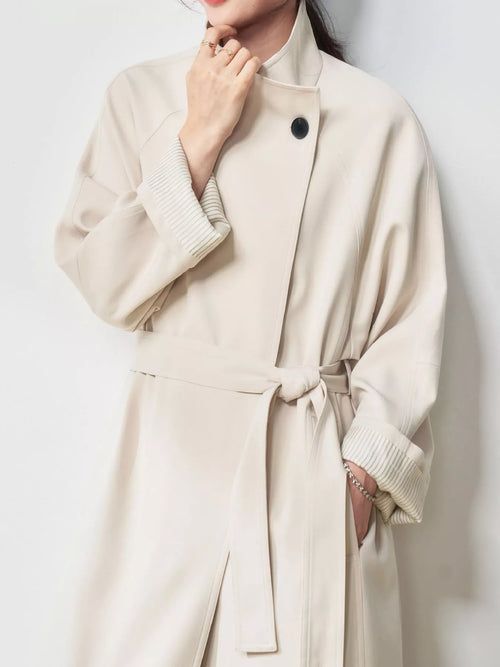 Asymmetric Button Belted Longline Trench Coat in Beige by Belle Bijouix – view 2 of 15
