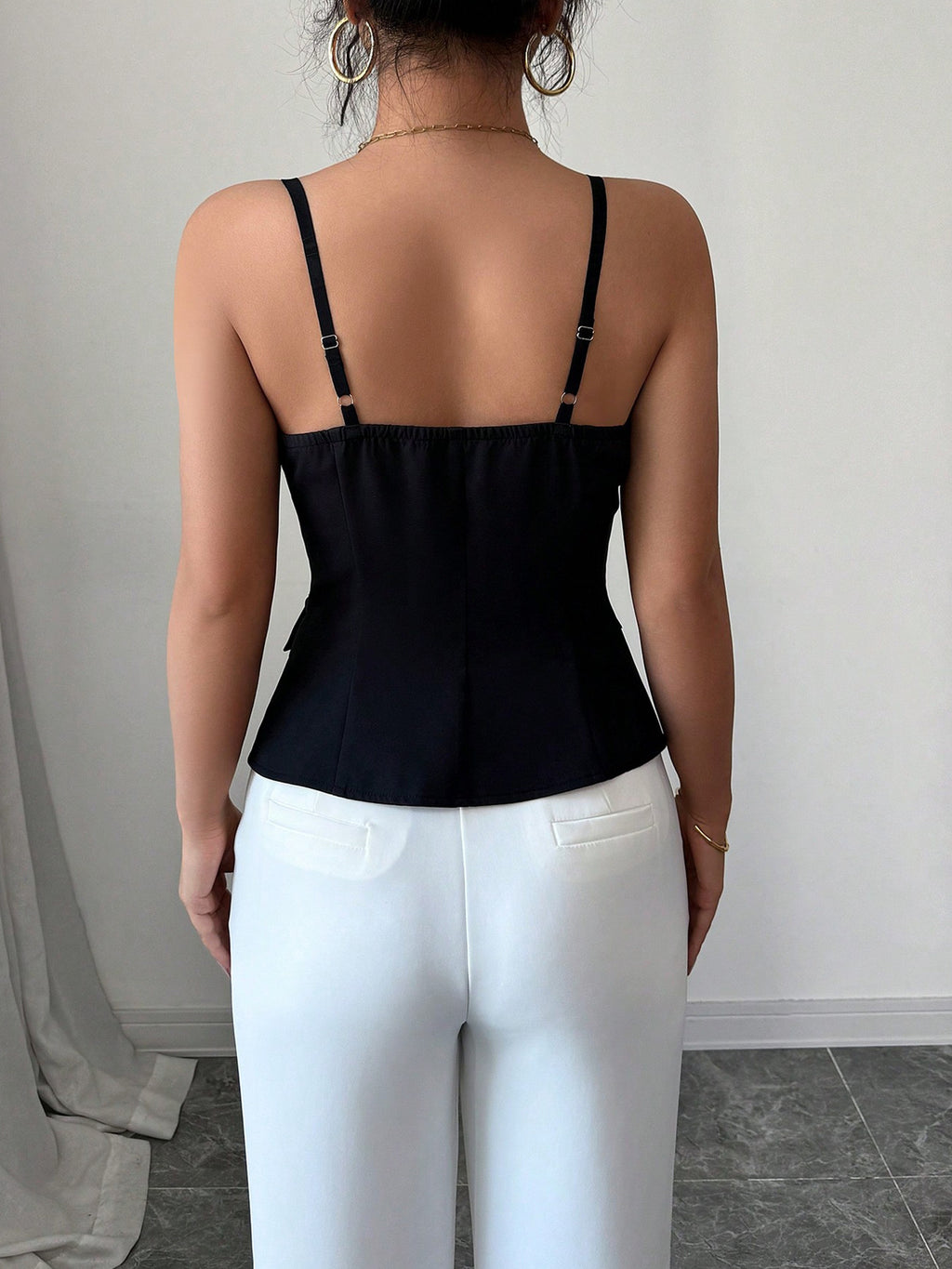 Button-Front Fitted Cami by Trendsi in black, back view with adjustable straps.